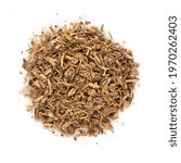 Small photo of A pile of dry Angelica root isolated on white background