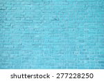 stock-photo-blue-brick-wall-background-277228250.jpg