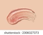 Small photo of Glowing peach orange waves swatch shimmering cosmetic miracle texture gel isolated on beige