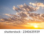 Sky and cloudscape at sunset. Nature scene background.