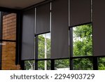 Gray blind or curtains on the glass window