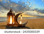 Small photo of Shiny golden crescent moon with star lantern and arabic lantern on sea beach at beautiful sunset sky with cloud, Ramadan kareem background