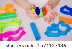 child hands playing with... | Shutterstock . vector #1571127136