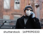 Sick Man Wears Protective Mask...