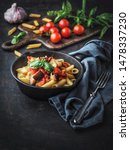 Small photo of Pasta alla norma. Traditional Sicilian pasta dish with eggplant and tomato sauce.