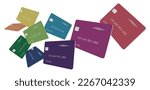 Small photo of Nine credit card or debit cards in the colors of the spectrum float above a white background in this 3-D illustration.