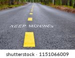 Words of keep moving with yellow line marking on road surface, transportation concept and business idea