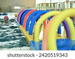 Small photo of Colorful wacky Noodles in swimming Pool Toys Foam Stick, Swimming Pool Noodles.
