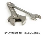 Small photo of Monkey wrenches isolated on white background. Still-life picture taken in studio with soft-box.