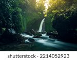 Indonesian natural scenery with waterfalls in the morning the sun is shining