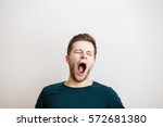 Portrait Of Yawning Man  On A...