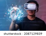 Small photo of Metaverse and Future digital technology.Man wearing VR glasses hand touching virtual Global Internet connection metaverse.Global Business, Digital marketing, Metaverse, Digital link tech, Big data