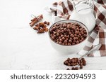 sweet crunchy chocolate children's breakfast chocolate balls on a white background.