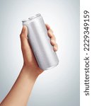 Men holding aluminum can with...