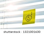 A Sticky Note With A Smiling...