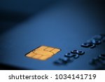 Blue bank credit debit card,blurred copy space,suitable for adding text, macro closeup shot,Coronavirus COVID-19 global pandemic crisis,cryptocurrency alternative EMV method of money transfer concept