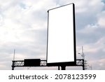 vertical billboard against the background of the cloudy sky. mockup, place for your information or advestering