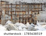 Small photo of Steel corrosion in reinforced concrete.Reinforced concrete with damaged and rusty steel bar in marine and chloride environments.Degraded concrete and corrosion of reinforcement bars:Concrete cancer