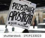 Small photo of Krakow, Poland - February 14 2021: Banner with text APOSTASY STOP and hashtags ENOUGH OF SILENCE