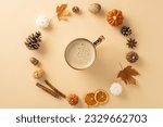 Small photo of Autumnal attributes concept. Above view photo of cinnamon sticks, chinese anise, dried oranges, pinecones, acorns, maple leaves and candles forming a circle for coffee cup on grey isolated background