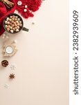 Small photo of Revel in wintertime allure through top-view vertical shot. Luscious hot chocolate cup, embellished with cinnamon, anise, candle, pine cone, intricate snowflakes, cozy scarf on soothing pastel backdrop