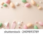A festive Easter scene unfolds in this top-view snapshot. Vibrant eggs, endearing bunny ears and sprinkles decorate a pastel beige surface with an open area for your text or advertisement