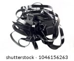 Small photo of Tefillin -[Jewish phylactery] with black straps on a with blackground
