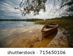 Old Wooden Boat And Tree Branch ...