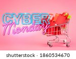red paper bags in small shopping trolley near cyber monday lettering on pink