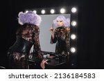 Drag Queen In Violet Wig And...