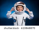 Little girl in space suit...