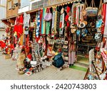 Small photo of Tangier, Morocco - December 29, 2023: Goods for sale in the busy souks in Tangier, Morocco