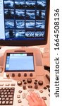 Small photo of Ultrasound machine doctor"s hand using investigation USCG with trackball while scanning patient with ultrasonic transducer doing breast,Skillful sonographer for check breast cancer and result.