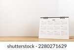 Small photo of Calendar year 2024 schedule on wood table white background. 2024 calendar planning appointment meeting concept. copy space.