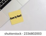 Small photo of Know by heart ask writing text post it paper in office on laptop computer keyboard. Message know by heart concept. top view.