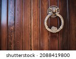 Brown Wooden Door With Brass...