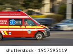 Small photo of Bucharest, Romania - April 01, 2021: A panning shot with an Emergency Service for Resuscitation and Extrication, short named SMURD, ambulance speeding through the traffic in Bucharest.