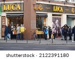 Small photo of Bucharest, Romania - January 04, 2022: People are queue in line to buy pretzels from Luca Pretzels Bakery in Bucharest