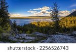 Small photo of Sunset view of the Jenny Lake from the Jenny Lake Loop Trail near Inspiration Point in Grand Teton National Park, Wyoming, USA.