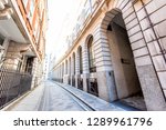 Small photo of London, UK Ironmonger lane narrow alley street by Bank of England and Royal Exchange exterior architecture in morning with tunnel arch called Prudent Passage