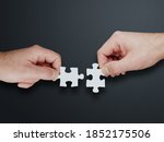 hands of two people putting... | Shutterstock . vector #1852175506