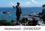 Small photo of salvador, bahia, brazil - april 2, 2023: view of the statue of the poet Castro Alves and in the background the Baia de Todos os Santos in the city of Salvador.