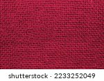 Small photo of Top view of sackcloth fabric for background. Close-up of viva magenta color sackcloth texture for background.