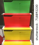 Small photo of Colorful Suspension Folders Foolscap Size Hanging on Racks
