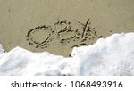 Obx Written In The Sand On The...
