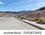 View of low water level at Lake Mead, Nevada in 2022 with sign showing where it was in 2002.