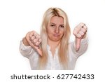 Small photo of Cute blonde thumbs down, losing streak, failure, expressing contempt