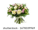 Fresh, lush bouquet of colorful flowers  for present isolated on white background. Wedding bouquet of roses and freesia flowers