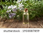 A Bottle Of Essential Oil With...