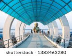 Small photo of Rayong, Thailand - March 31, 2019: View of entrance pier gate to Samed Island with the Pisue Samutr sculpture or a female yak who can transmute herself into a beautiful girl in Rayong, Thailand.